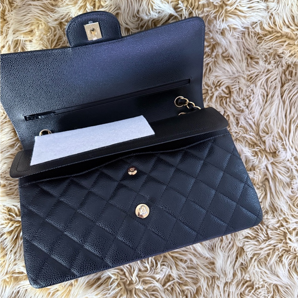 Chanel LARGE CLASSIC HANDBAG
Grained Calfskin & Gold-Tone Metal retail $11,700 - Picture 10 of 15